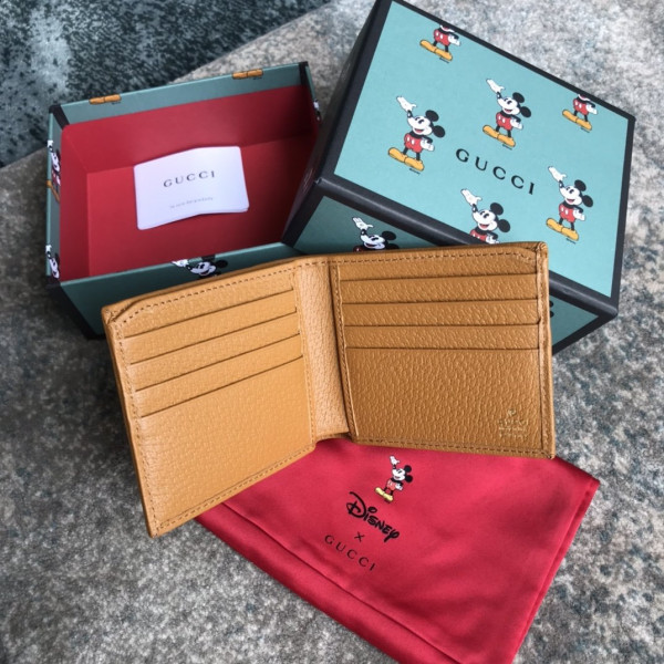 disney x G*u*i gg wallet