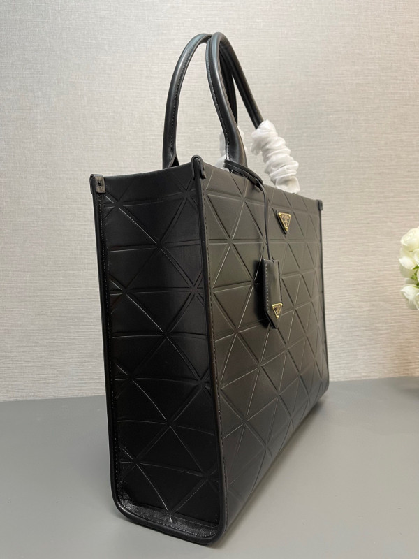 Pra*a symbole large leather bag $ 4,200